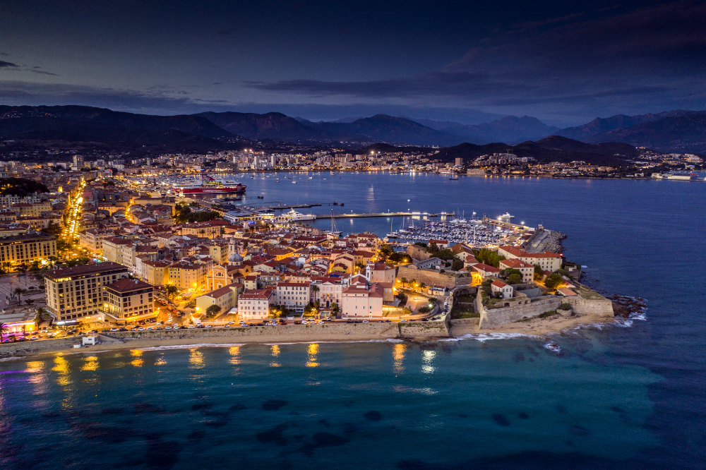 Aerial view of the illuminated cityscape of Ajaccio in Corsica. Corse-du-Sud, in France